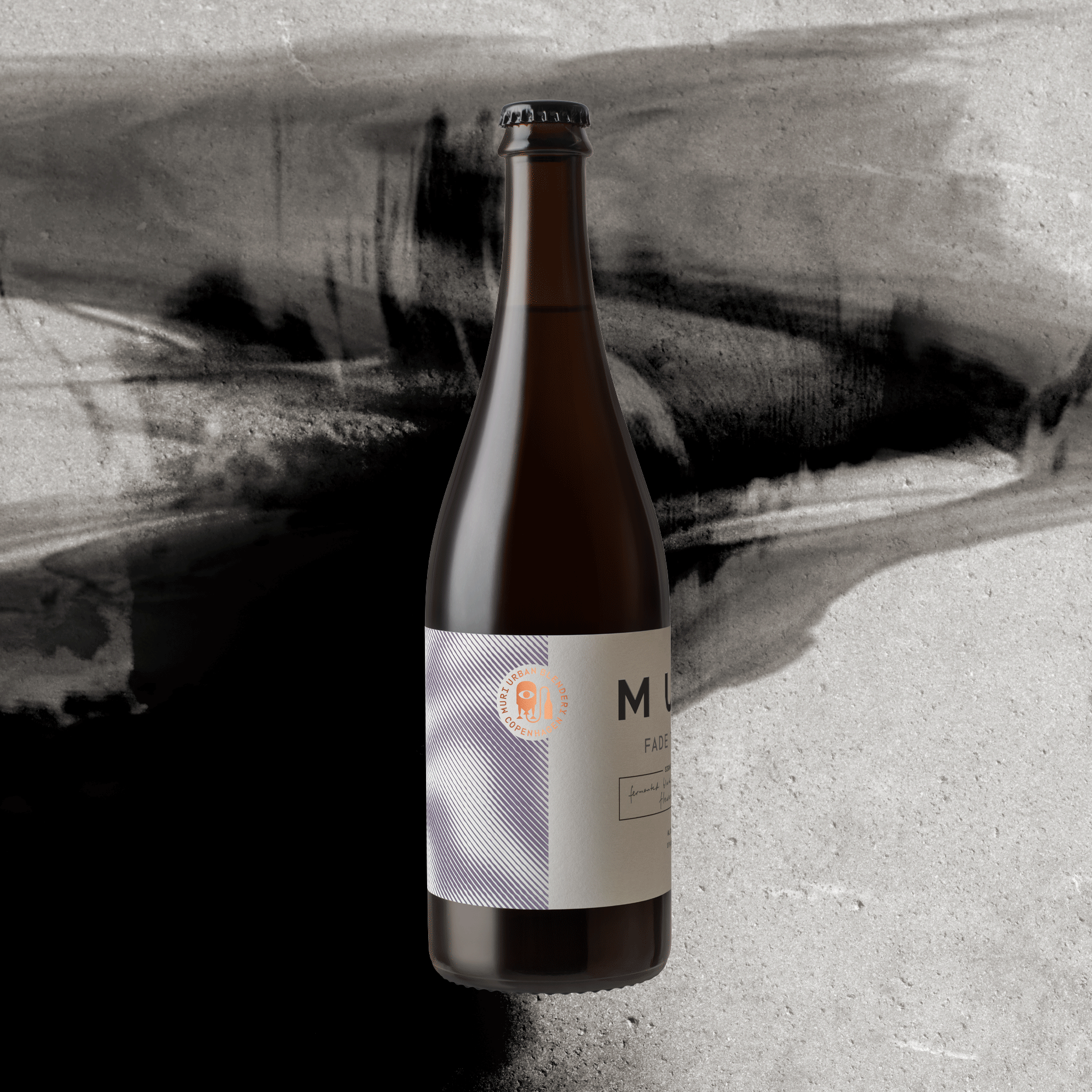 Bottle of Fade to Black on concrete background